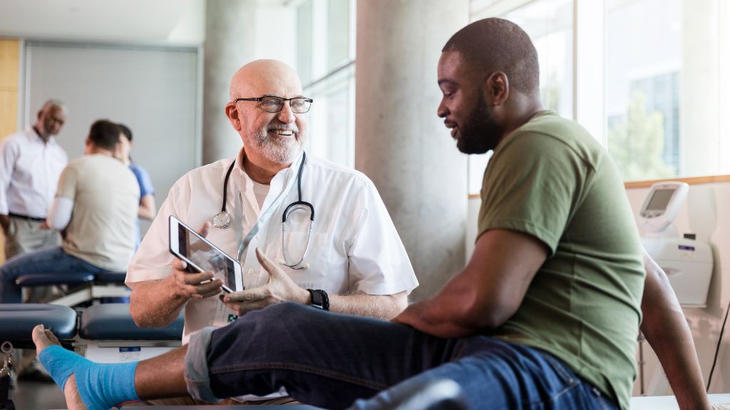 Doctor Evaluating a Veteran